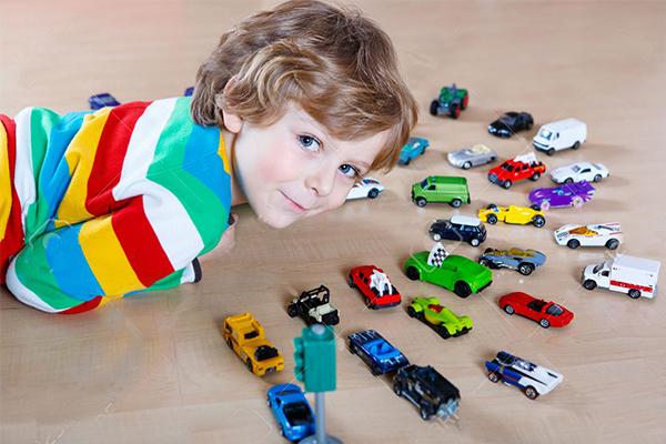 Should I encourage other forms of play for my son who only wants to play with cars